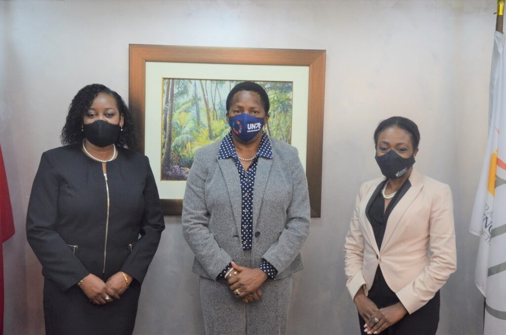 Minister Beckles center, with Claire Davidson-Williams, Permanent Secretary and Ms. Jayselle McFarlane, newly-appointed Managing Director of the HDC.